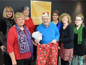 An initial payment of $70,000 was made this week to each of the four women's shelters supported by the Regina Leader-Post Christmas Cheer Fund. Pictured are Leader-Post lifestyles co-ordinator Irene Seiberling (left), Margaret Crowe of WISH Safe House, Maria Hendrika of Regina Transition House, Jim Toth of the Leader-Post Foundation, Carol Yoner of the YWCA Regina's Isabel Johnson Shelter, Sarah Valli of SOFIA House and Janet Tzupa of YWCA Regina's Isabel Johnson Shelter.