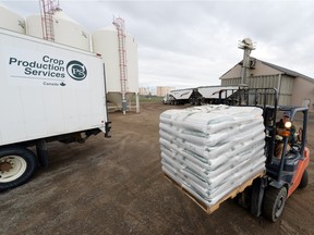 Bulk fertilizer being loaded at Crop Production Services, an Agrium subsidiary, in north Regina. Sales of agricultural supplies helped Saskatchewan post a record $2.4 billion in sales in October.