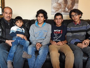 Hany al Moulia, centre, a 22-year-old Syrian refugee with his father Mohammed and brothers Ashraf, Houssien and Ibrahim who came to Regina earlier this year.