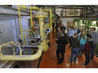 Students from the Prairie South School Division on a visit to the Legislative Powerhouse Building, one of the oldest boiler systems in the province.