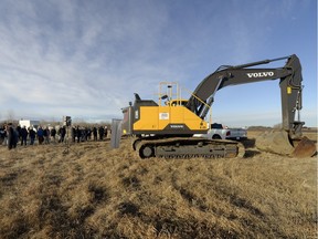 A small crowd gathers just off the Trans-Canada Highway near White City to officially begin construction of an overpass, part of the $1.2-billion South Regina Bypass project.