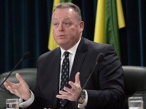 Provincial Finance Minister Kevin Doherty  delivers the province's mid-year financial update to the media at the Saskatchewan Legislature November 30, 2015.