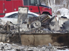 The scene of the house fire on the Makwa Sahgaiecan First Nation that killed two young children, siblings Hayley and Harley Cheenanow.