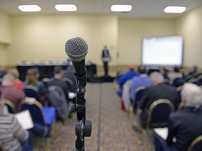 A microphone stands in the middle of a room during an information session on the opening day of the Saskatchewan Urban Municipalities Association convention held at Queensbury Convention Centre in Regina on Jan. 31, 2016.