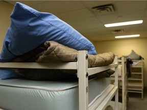 A pillow and blanket sit on a mattress at Waterston House homeless shelter in Regina on Jan. 16.