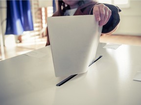 A voter casting a ballot.