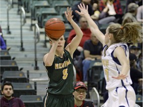 University of Regina Cougars guard Kehlsie Crone puts up a three-pointer during a game against the Trinity Western Spartans on Sunday at the Centre for Kinesiology, Health and Sport.