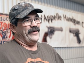 Kim Barbeau, president of the Qu'Appelle Handgun Club, at the Regina gun show held at the Turvey Centre on Jan. 9, 2016.