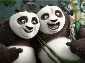 Po (voiced by Jack Black) and his long-lost panda father Li (voiced by Bryan Cranston) pose for a portrait in Kung Fun Panda 3.