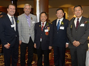 Michael Fougere, Marc Docherty, Nelson Eng, Shang Haixin, and Gao Zhenting at a Chinese New Year celebration, organized by the Regina branch of the Chinese Freemasons of Canada, held at the Casino Regina Show Lounge on Saturday Jan. 30, 2016.