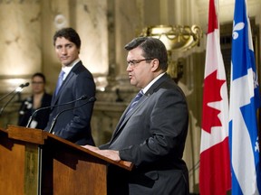 Prime Minister Justin Trudeau, left, and Montreal Mayor Denis Coderre address reporters at Montreal city hall on Jan. 26. They discussed, among other things, the mayor's opposition to the proposed Energy East pipeline.