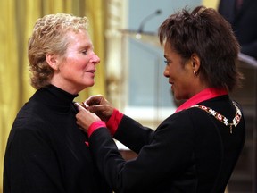 Heather Bishop (left) was presented with the Order of Canada by then-governor general Michaelle Jean in 2005.