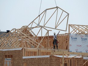 Canada Mortgage and Housing Corporation says there's evidence of overbuilding in real estate markets in Calgary, Saskatoon, Regina and Ottawa.
