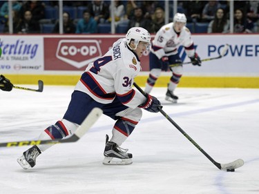 Regina Pats defence Jared Freadrich brings up the puck during a game at the Brandt Centre in Regina, Sask. on Saturday January 23, 2016.