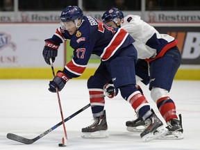 Centre Adam Brooks, shown with the puck, has a chance to become the first member of the Regina Pats to win the Western Hockey League's scoring title in 33 years.