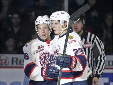 Regina Pats forwards Cole Stanford and Sam Steel  celebrate a goal against the Prince Albert Raiders at the Brandt Centre in Regina, Sask. on Saturday January 23, 2016.