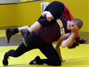 University of Regina Cougars wrestler Kayla Brodner, shown here during a practice on Feb. 24, 2015, won a gold medal for the Cougars at the Golden Bear Open in Edmonton on Saturday.