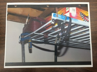 A reproduction of a photo entered as an exhibit at the Goforth trial. It shows a storage rack from which a cargo strap hung in the basement of the Regina home where Tammy and Kevin Goforth resided.