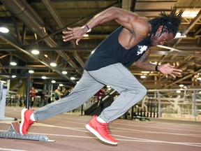 Sprinter Tevaughn Campbell, a member of the Calgary Stampeders, is practising with the University of Regina Cougars track team.