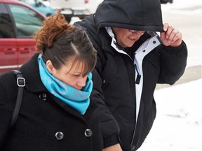 Tammy Lynn Goforth (L), 39, and Kevin Eric Goforth (R), 40, arriving at Regina Court of Queen's Bench to face charges of second-degree murder in the death of a four-year-old girl and unlawfully causing bodily harm to another girl.