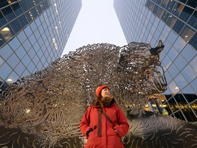 Amber Phelps Bondaroff, the new artist-in-residence for the Regina Downtown Business Improvement District, stands on Scarth Street in Regina on Jan. 19, 2016.