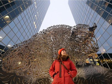 Amber Phelps Bondaroff, the new artist-in-residence for Regina Downtown Business Improvement District, stands downtown in Regina on Tuesday.