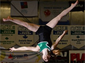 Gymnast Denelle Pedrick practises her side aerial on the balance beam at the Queen City Kinsmen Gymnastics Club.