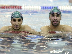 Algerian-born swimmers Anis Baghriche, left, and Nail Kaddache after a recent Regina Optimist Dolphins practice at the Lawson Aquatic Centre.