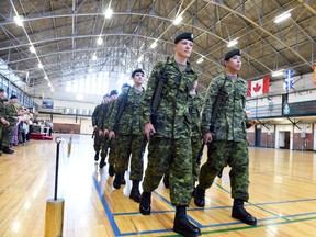 Graduates from the first year of the high school military training course in June 2015.