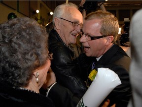 Premier Brad Wall celebrating his 2011 election victory with supporters in Swift Current.