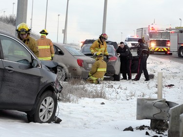 Police, Fire, and EMS respond to the scene of a three car collision on Ring road near Ross Ave. Wednesday morning.