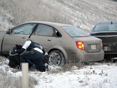 Police, Fire, and EMS respond to the scene of a three car collision on Ring road near Ross Ave. Wednesday morning.