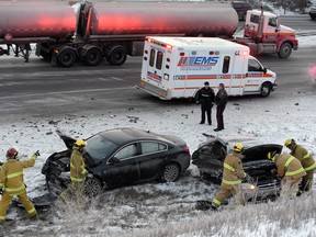 Police, Fire, and EMS respond to the scene of a three car collision on Ring road near Ross Ave. Wednesday morning.