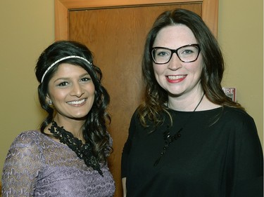 Neha Jain and Caitlin Aldcorn, of Access Communications, at the screening of the winners of the 62nd International Advertising Festival in Regina on Friday night.