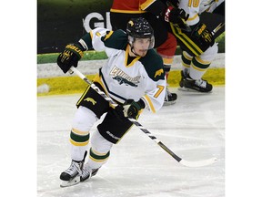 University of Regina Cougars forward Mark Schneider wheels up ice during Friday's Canada West game against the Calgary Dinos at the Co-operators Centre.