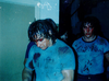 Dynamite Kid (foreground) and Bret Hart (background) at a Stampede Wrestling event at the Exhibition Auditorium.