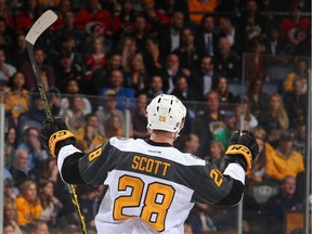 Veteran enforcer John Scott was named the most valuable player of Sunday's NHL all-star game.