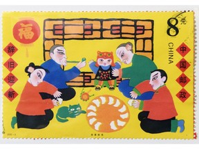 A colourful Chinese postage stamp is displayed at a stamp show and sale held by the Regina Philatelic Club at the Senior Citizens Centre in Regina on Saturday Feb. 20, 2016. This stamp belongs to collector Al Wingate.