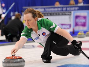 Ashley Howard lines up a shot in the third end in action at The Scotties Tournament of Hearts in Grande Prairie Alberta in the afternoon draw on Monday Feb 22. Photo by Rob Ganzeveld,
