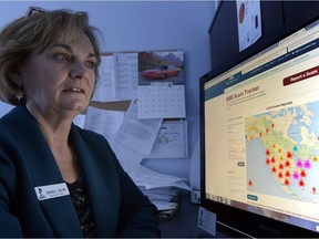 Better Business Bureau President Karen L. Smith demonstrating its scam tracker program.