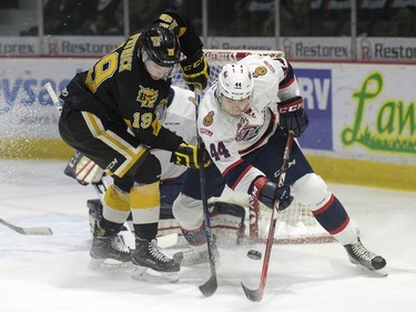 Brandon Wheat Kings forward Nolan Patrick (19) battles with Regina Pats defence Connor Hobs (44) during a game held at the Brandt Centre in Regina on Saturday Feb. 13, 2016.