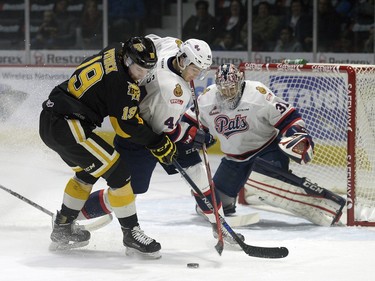 Brandon Wheat Kings forward Nolan Patrick (19) is blocked by Regina Pats defence Connor Hobs (44) during a game held at the Brandt Centre in Regina on Saturday Feb. 13, 2016.