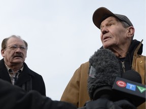 Bruce Bolingbroke, right, speaks to media about his concerns over his land and the Regina Bypass while Rick Swenson, left, leader of the Progressive Conservative Party of Saskatchewan, listens.