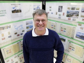Ian Yeates stands in front of his display of stamps of Japanese National Parks at a stamp show and sale held by the Regina Philatelic Club at the Senior Citizens Centre in Regina on Saturday Feb. 20, 2016.