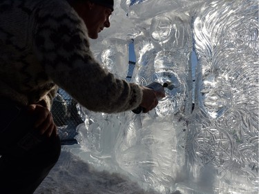 Artist Douglas Lingelbach, of Saskatoon, carved an ice sculpture tilted Impermanence: From the creator to the creator. The piece incorporates the faces of the four victims of the Jan. 22 shootings in La Loche and was done in conjunction with artist Kevin Bendig of Big River who wrote the story and planned the build of the piece.