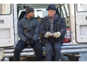 Michael B. Jordan, left, and Sylvester Stallone in a scene from Creed. (Barry Wetcher/Warner Bros. Pictures via AP)