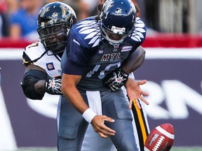 Defensive tackle Ted Laurent, left, shown chasing down Montreal Alouettes quarterback Jonathan Crompton in 2014, is the best player available via free agency in 2016.