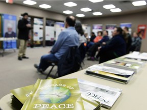 Pamphlets sit on a table at Holy Qur'an Open House to Demystify Islam held at Sunrise Library that was organized by the Ahmadiyya Muslim Association.