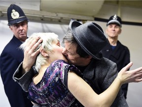 David Warford kisses Irene Paul as police bobbies Brad Graham (L) and Peter Bruce (R) look on in amazement while rehearsing The 39 Steps, the latest production from Regina Little Theatre.