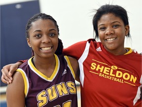 Keyara Donaldson, left, of the LeBoldus Golden Suns and Sydney Teece of the Sheldon-Williams Spartans were adopted from the same agency in Louisiana.